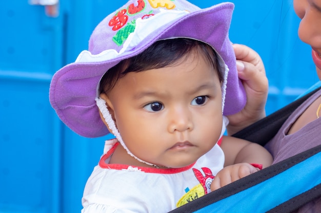 Portrait of young cute Asian little girl smile and looking camera.