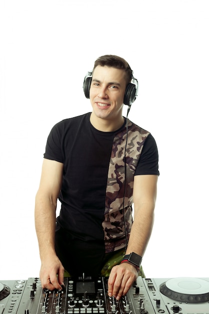 Portrait of a young DJ isolated on white background