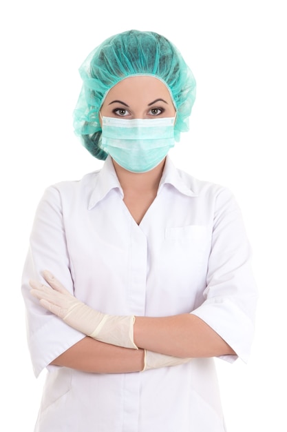 Portrait of young female doctor over white background