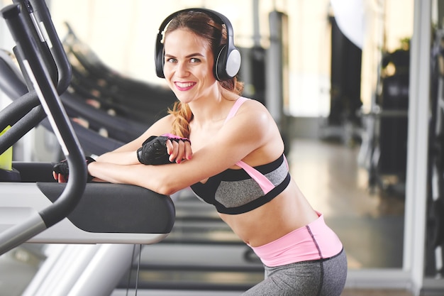 Portrait of a young girl on the background of the gym