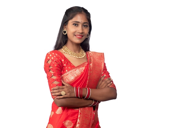 Portrait of a young girl or woman posing on white background