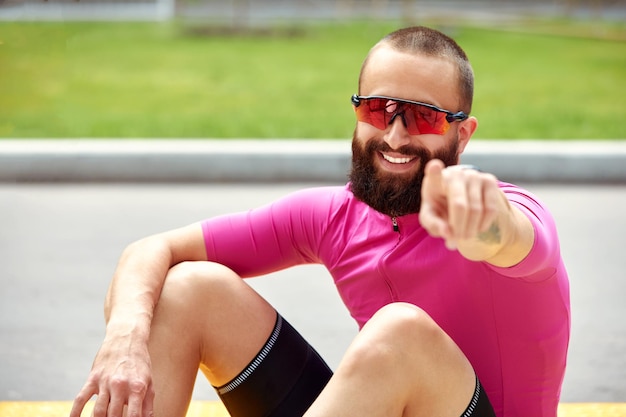 Portrait of a young handsome male cyclist