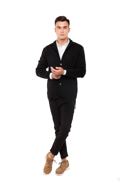 Portrait of the young happy smiling man isolated on a white background