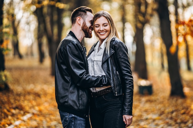 Portrait of a young loving couple hugging and smiling