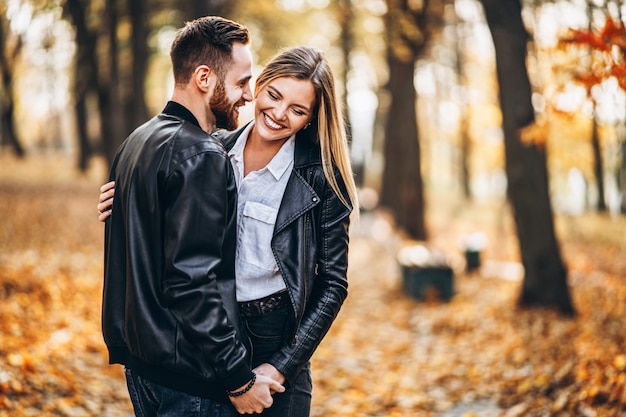 Portrait of a young loving couple hugging and smiling