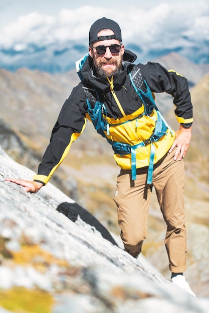 Portrait of young male explorer in the mountains