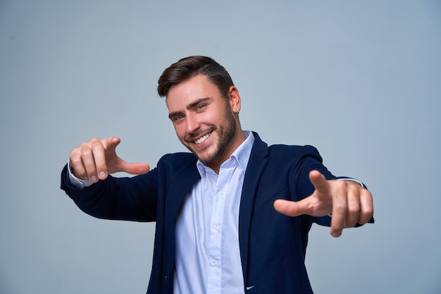 Portrait of a young man businessman in suit