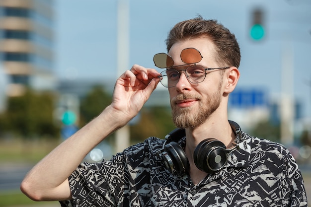 Portrait of a young man in sunglasses