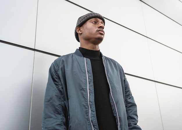 Portrait young man wearing cap