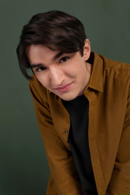 Portrait young man wearing shirt posing