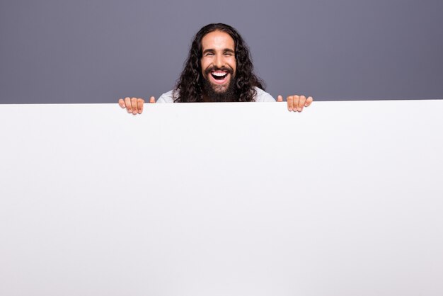 portrait young man with beard and long hair