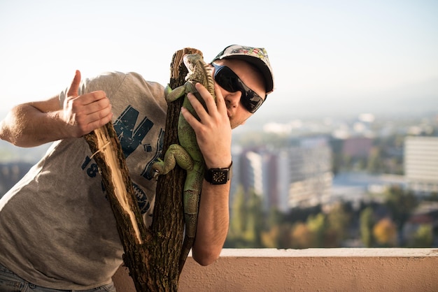 portrait of the young man with the iguana