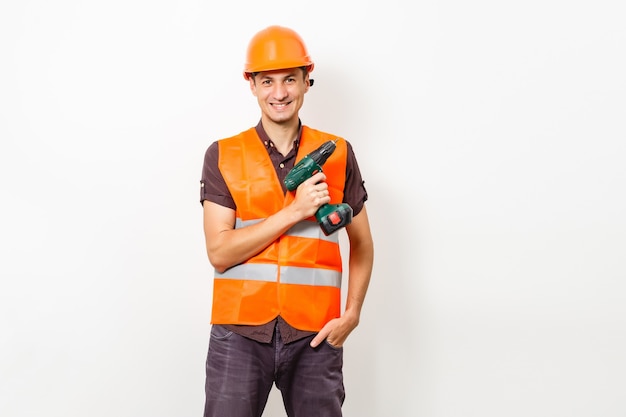 portrait of young manual worker thumb up isolated on white