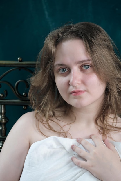 Portrait of a young pretty attractive brownhaired girl