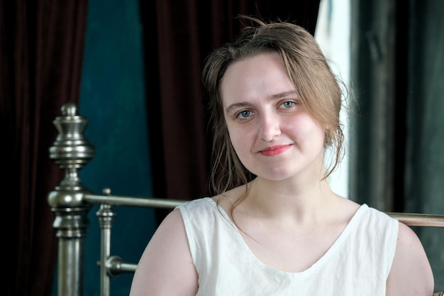 Portrait of a young pretty attractive brownhaired girl