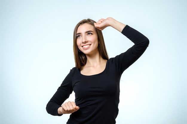 Portrait of young smiling woman Caucasian brunette model in emoshions and optimistic positive happy feeling Isolated on white