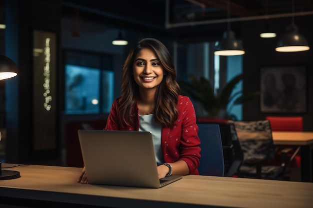 Portrait of Young Successful Caucasian Businesswoman Sitting at Desk Working on Laptop Computer in C