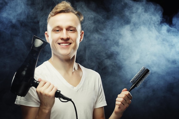 Portrait of young t hairstylist looking at camera