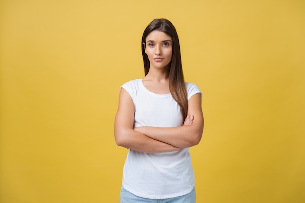 Portrait of young teenage girl with healthy skin wearing striped top looking at camera