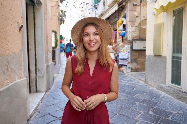 Portrait of young tourist woman in the historic village of Tropea Calabria Italy