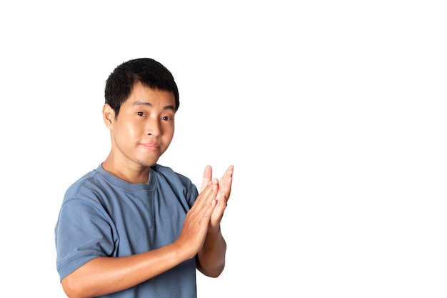 Portrait of young  wearing casual t-shirt applauding. congratulation and clapping hands and presentation concept. studio shot isolated on white background.