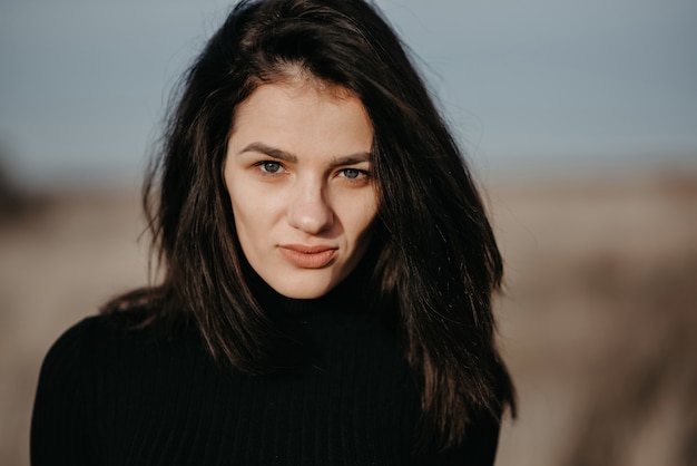 Portrait of a young woman brunette girl