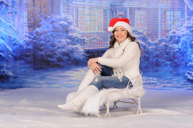 Portrait of young woman celebrating christmas