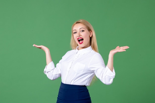 portrait of young woman in conservative clothing green wall schools teacher student lesson study