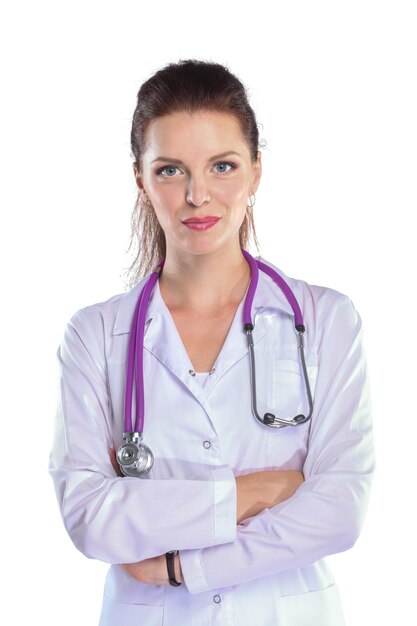 Portrait of young woman doctor with white coat standing in hospital Portrait of young woman doctor