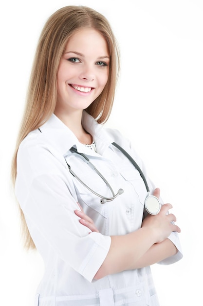 Portrait of young woman doctor with white coat standing in hospital