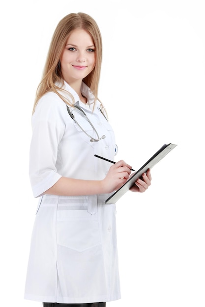 Portrait of young woman doctor with white coat standing in hospital