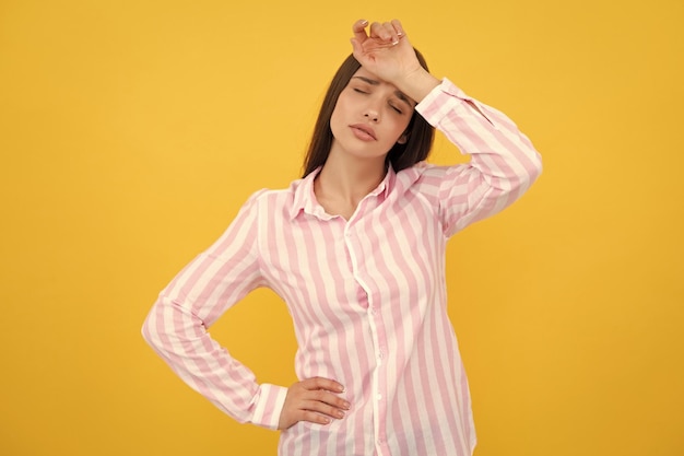 Portrait of young woman feeling stress or strain headache Exhausted tired girl desperate and stressed because pain and migraine Upset sad depressed model with hands on head