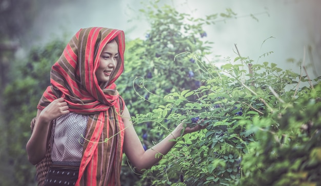 Portrait of a young woman posing in nature