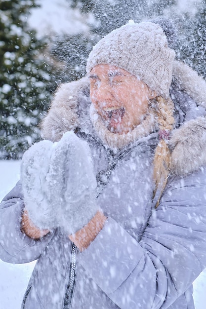 Portrait of young woman in snowy winter