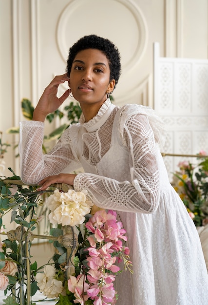 Portrait of young woman with flowers wearing a boho chic dress