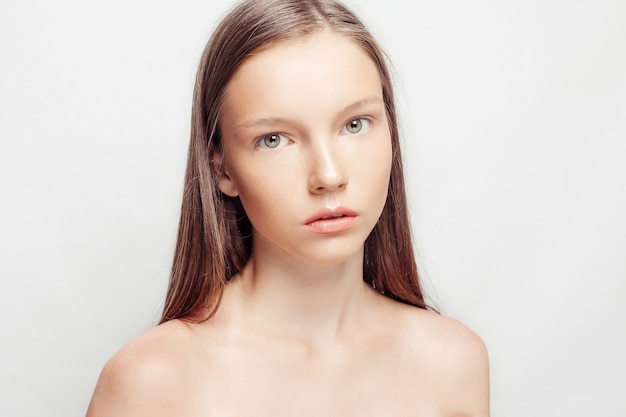 Portrait of young woman with natural makeup