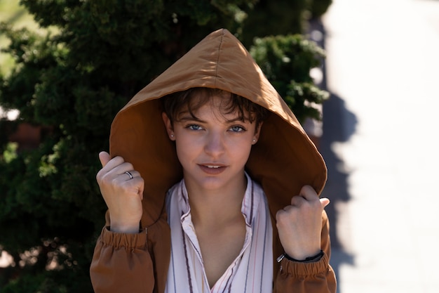 Portrait of a young woman with a short haircut