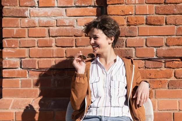 Portrait of a young woman with a short haircut