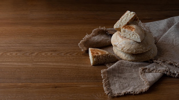 Portuguese breads Bolo Do Caco on table