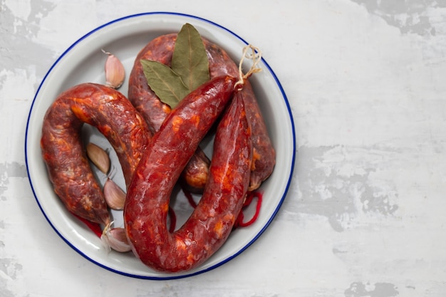 Portuguese smoked sausages in dish