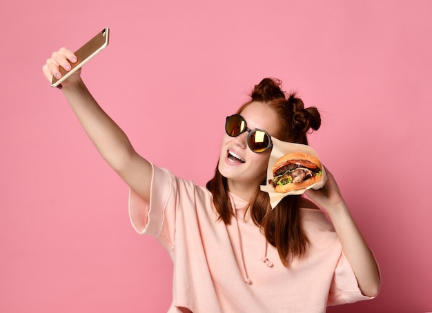 Positive ginger young woman pose for selfie