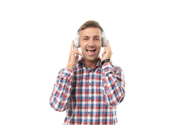 Positive man listen music in studio man listen music and wearing checkered shirt