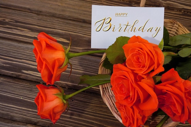 Photo postcard internet banner with a birthday greeting with the inscription happy birthday a bouquet