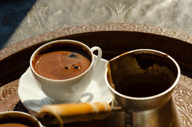 Pot and cup of Arabic ir Turkish Coffee