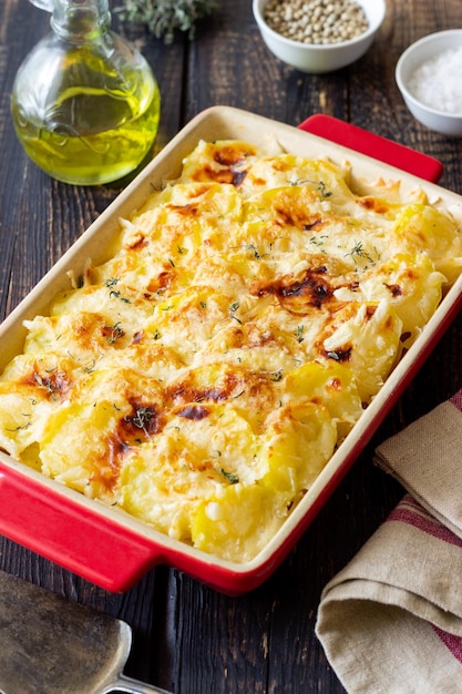 Potato casserole with cheese and cream Vegetarian food French food Gratin dauphinois