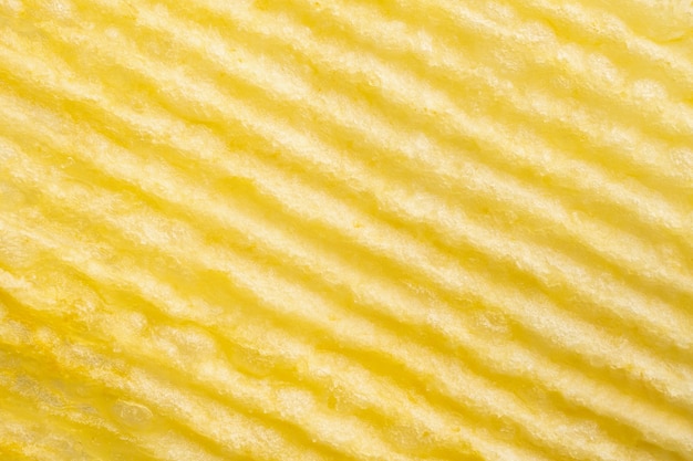 Potato chip macro texture background closeup