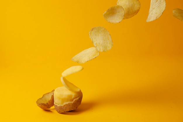 Potato chips on a yellow background