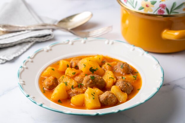 Potato dish with meatballs, Turkish name; koftleli sulu patates yemegi