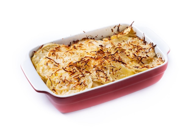 Potato gratin baked with cream and cheese isolated on white background