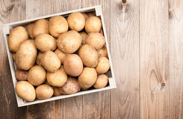 Potato harvest in a wooden box